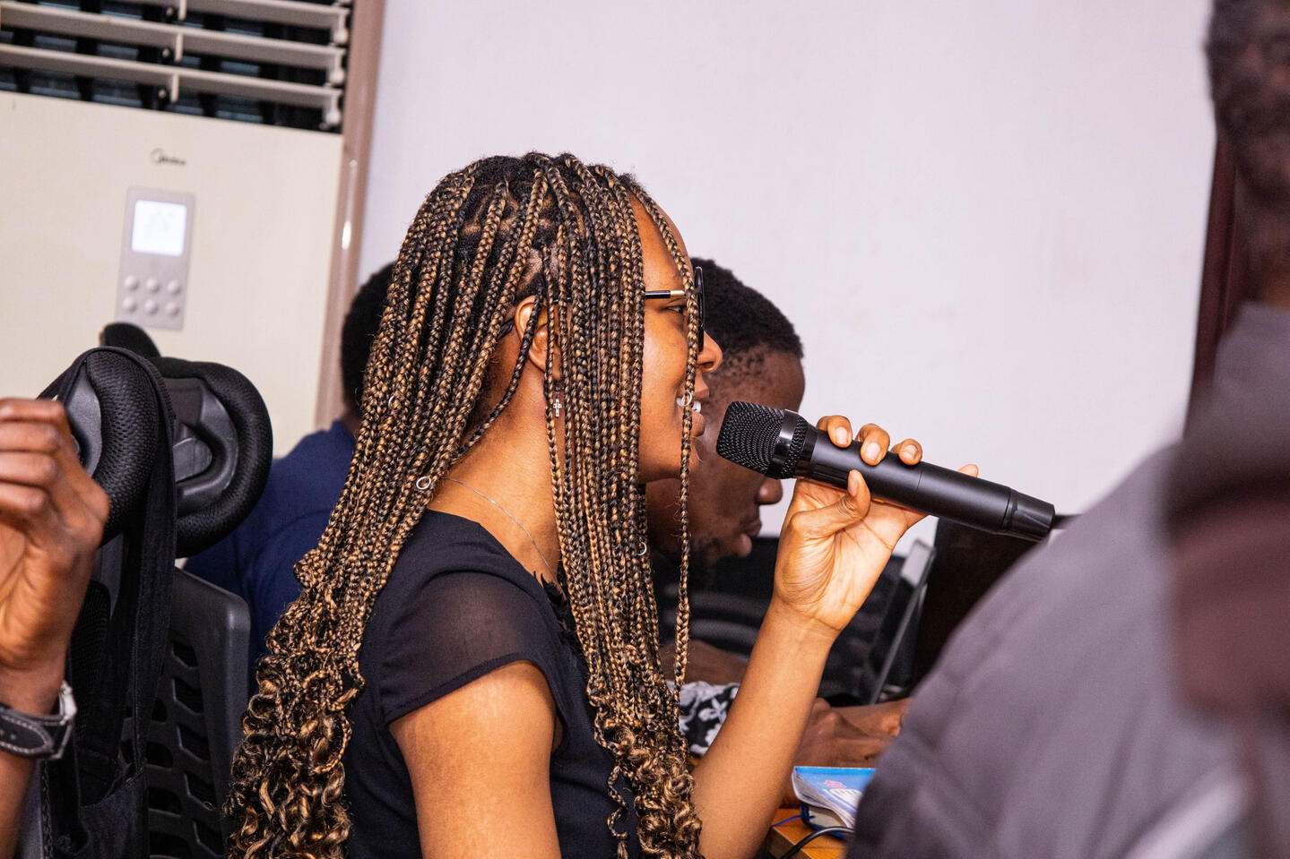 An image of me speaking at a event